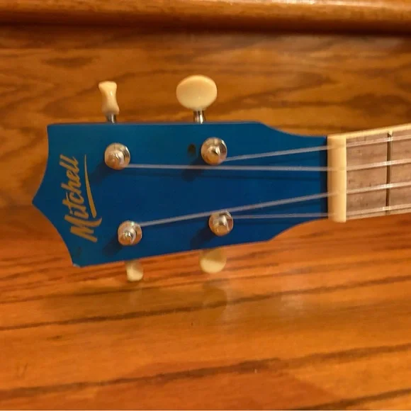 Blue Ukulele with Wooden Fretboard and case - Picture 2 of 13